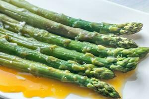 Steamed asparagus with eggs photo