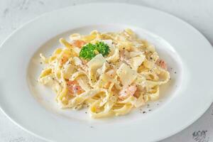 Portion of Shrimp Alfredo Pasta photo