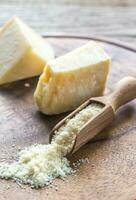 Parmesan cheese on the wooden board photo