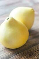 Two pomelos closeup photo