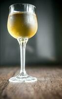 Glass of white wine photo