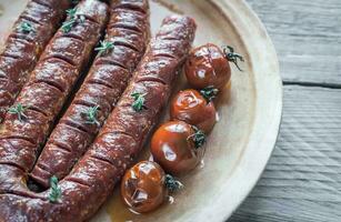 asado chorizo con Cereza Tomates foto