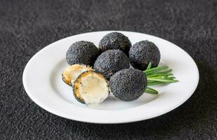 Black truffle mozzarella balls photo