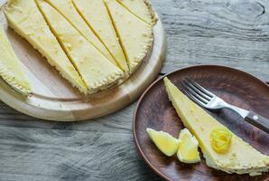 Portion of lemon tart on the plate photo