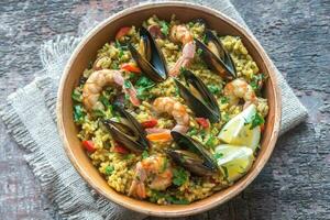 Bowl of seafood paella photo