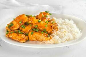 Portion of orange chicken photo