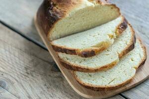 Brioche bread on the wooden board photo