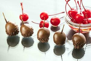 Chocolate and cocktail cherries photo
