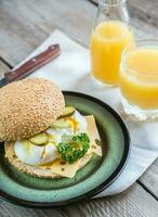 Sandwich with poached eggs photo