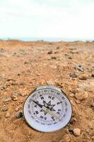 Compass on the ground photo