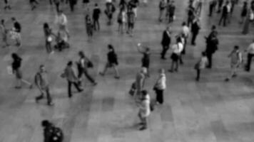 Unrecognizable anonymous people walking in the city streets video