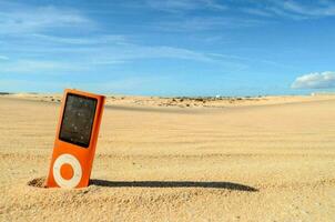 Music player on the beach photo