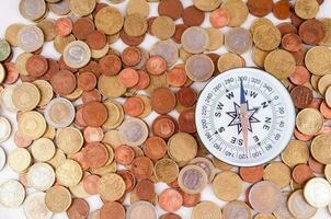 Compass with coins photo