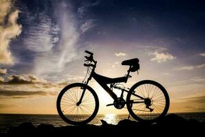 Bike over the sunset photo