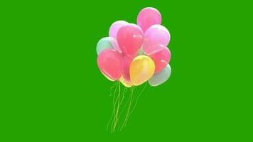 globos flotante en un verde pantalla video