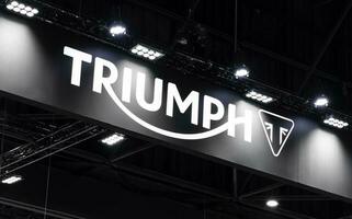 Nonthaburi Thailand 6 December 2022 hanging billboard with logo Triumph motorcycle at Thailand International Motor Expo photo