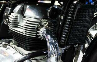 Close up shiny retro motorcycle engine photo