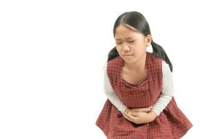 Asian child suffering from stomachache isolated photo