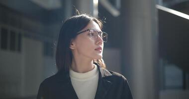 Portrait of Young woman dressed in formal business standing in workplace. photo