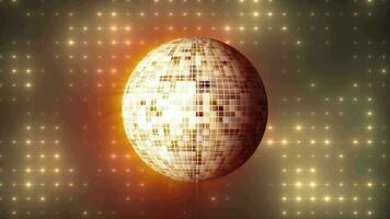 Abstract looped yellow orange mirrored spinning round disco ball for discos and dances in nightclubs 80s, 90s luminous background video