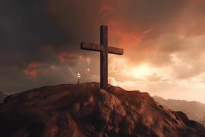 Cross on the top of the mountain with sunset background. photo