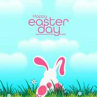 Vector Illustration of the Easter poster and the banner with rabbits and beautifully painted eggs on the grass in the background of the blue sky.