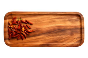 Dried chilies on a wooden cutting board, with empty space, flat lay top view, png