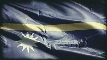 Retro aged Nauru flag waving on the wind. Old vintage Naursky banner swaying on the breeze. Seamless loop. video