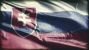 Retro aged Slovakia flag waving on the wind. Old vintage Slovak banner swaying on the breeze. Seamless loop. video