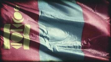 Retro aged Mongolia flag waving on the wind. Old vintage Mongolian banner swaying on the breeze. Seamless loop. video