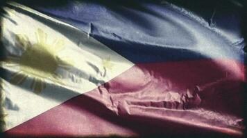 Retro aged Philippines flag waving on the wind. Old vintage Philippine banner swaying on the breeze. Seamless loop. video