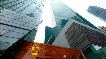 low angle view of singapore financial buildings located at financial district video