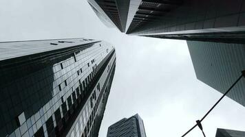 low angle view of singapore financial buildings located at financial district video