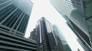 low angle view of singapore financial buildings located at financial district video