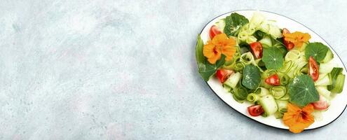 Vegetable salad with nasturtium, diet food. photo