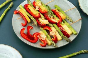 BBQ grilled vegetables on skewers photo