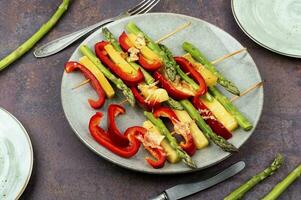 Vegetable skewers with asparagus and cheese. photo