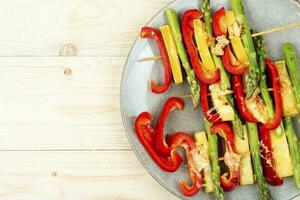 BBQ grilled vegetables on stick,space for text photo