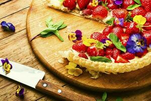 Open summer pie with strawberry photo