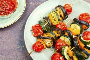 Vegetable skewers on wooden skewers. photo