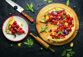 Open summer pie or cake with berries photo