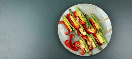 Vegetable skewers on skewers, space for text. photo