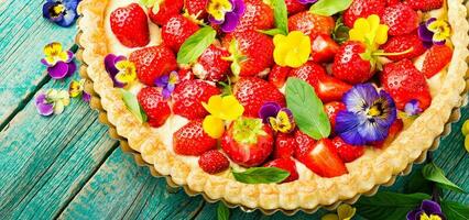 Open summer pie or cake with berries photo