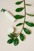 Natural home cosmetics in recyclable plastic bottles and cans on a beige background. Flat lay photo