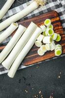 fresh leek cut vegetable meal food snack on the table copy space food background rustic top view photo