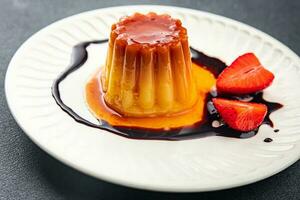 flan sweet dessert caramel taste healthy meal food snack on the table copy space food background rustic top view photo