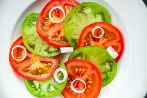 fresh tomato salad red and green fruit vegetable dish healthy meal food snack on the table copy space food background rustic top view photo
