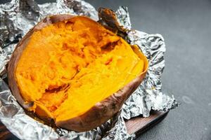 sweet potato baked vegetable meal food snack on the table copy space food background rustic top view photo