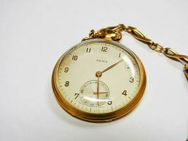 antiguo dorado bolsillo reloj Heinicke Zurich Olma foto
