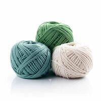 Yarn balls for knitting and crochet isolated on white background, cotton wool clews and skeins as natural organic material for knitwear, diy handmade fashion, photo